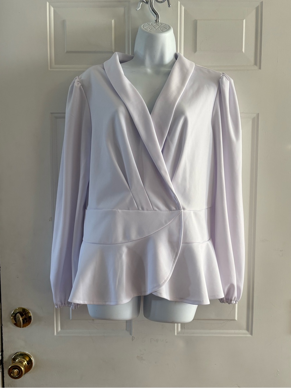 White Women's Wrap Peplum Long Sleeve Blouse. (Looks like XL)